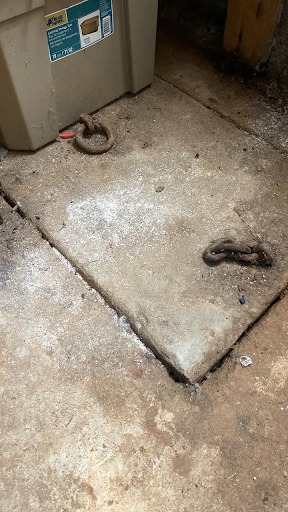 “Does anyone know what this might be? It’s located in the back right corner of our garage in a 1952 ranch-style home in California. I’ve tried lifting it, but it’s too heavy for me. Lol” Credit: Lisa Vogt Knapp